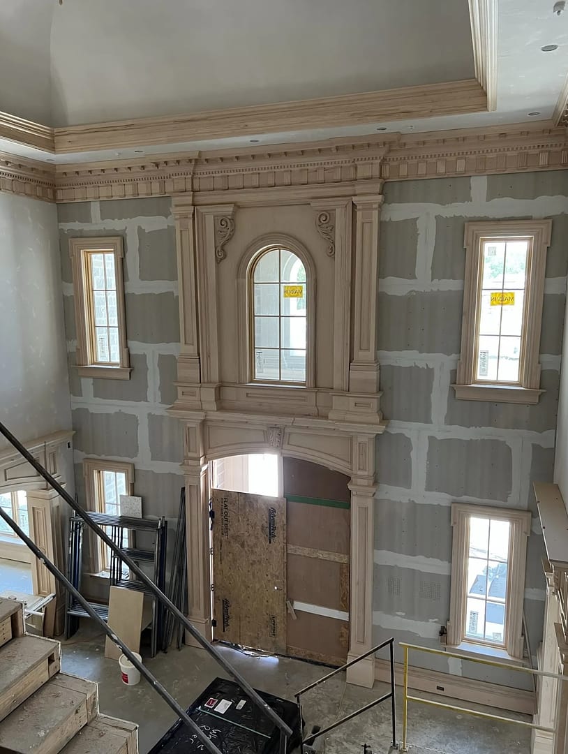 Timber beams and paneled walls during construction