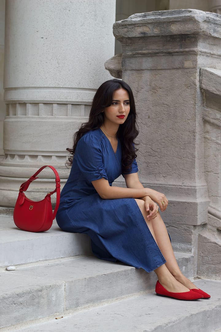 a lady in a denim dress